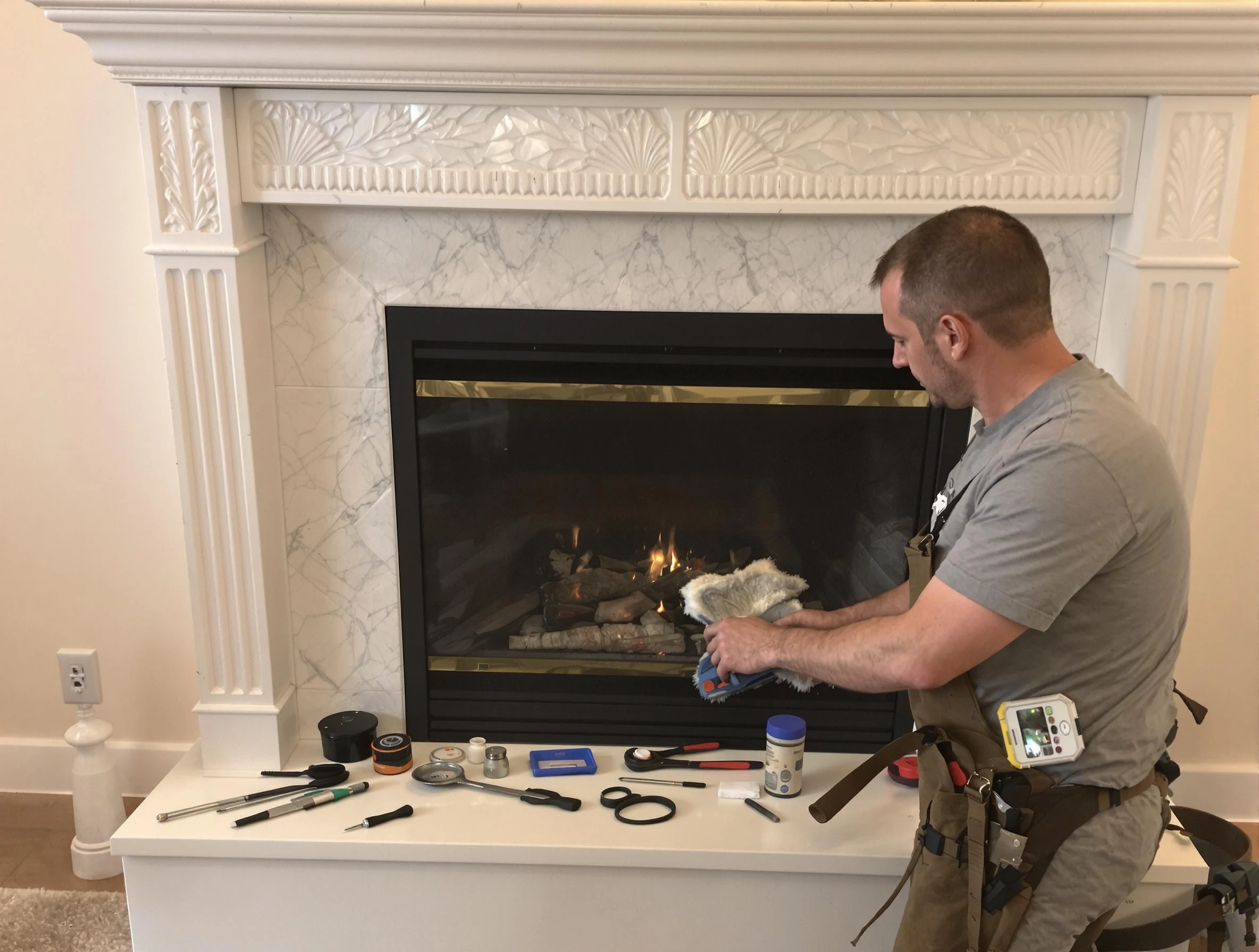 Cranston Chimney Sweep performing fireplace maintenance in Cranston, RI
